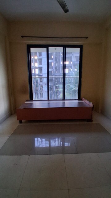 Room in 2 BHK Apartment at Airoli Sector 20 – for Rent