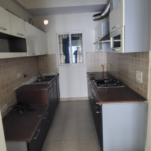 Kitchen in 2.5 BHK Apartment at Mahagun Moderne, Sector 78 – for Rent