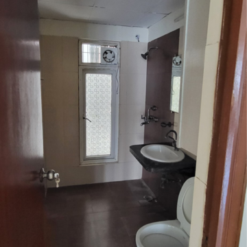 Bathroom in 2.5 BHK Apartment at Mahagun Moderne, Sector 78 – for Rent