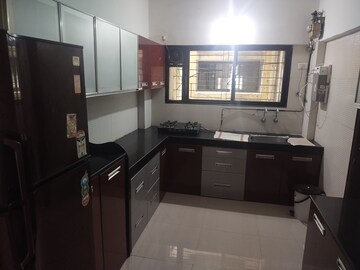 Kitchen in 2 BHK Apartment at Aswani Green Valley, Wakad – for Sale