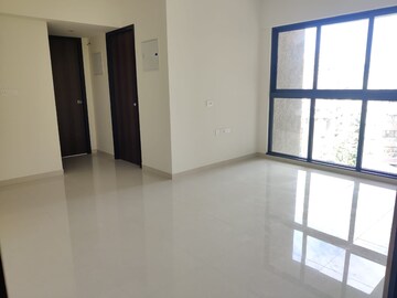 Living Room in 1 BHK Apartment at Lodha Casa Maxima, Mira Road – for Rent