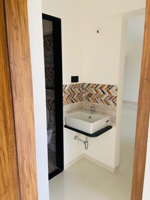 Bathroom in 2 BHK Apartment at Krishna Amorapolis, Dhanori – for Rent