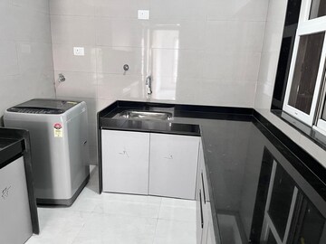 Kitchen in 1 BHK Apartment at Vaibhav Queens Park, Chembur – for Sale