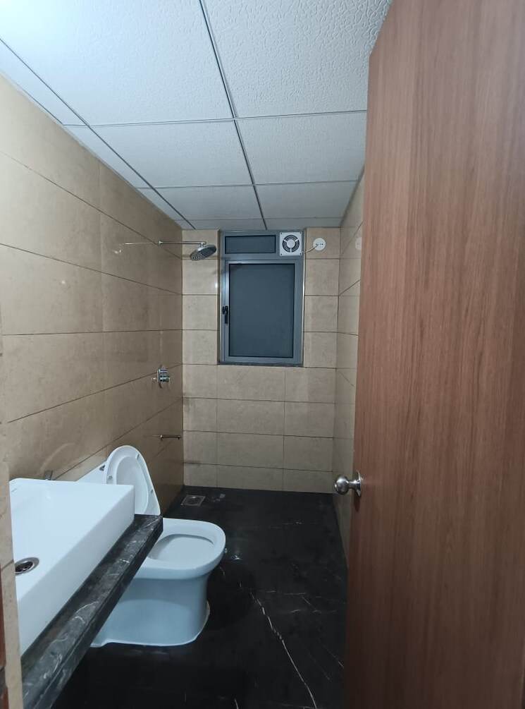 Bathroom, kalpataru-immensa 2 Bedroom 805 Sq.Ft. Apartment In Kolshet Road Thane 9421576