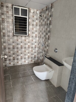 Bathroom in 2 BHK Apartment at Mantra Monarch, Balewadi – for Rent