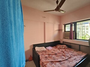 Bedroom in 1 BHK Apartment at Lokhandwala Infrastructure Spring Leaf, Kandivali East – for Rent
