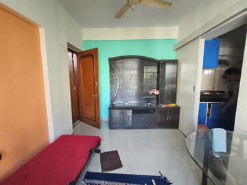 Living Room in 1 BHK Apartment at Lokhandwala Infrastructure Spring Leaf, Kandivali East – for Rent