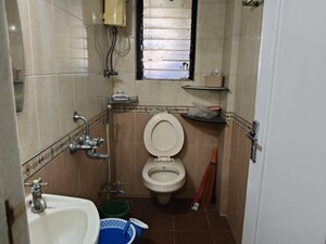 Bathroom in 1 BHK Apartment at Lokhandwala Infrastructure Spring Leaf, Kandivali East – for Rent