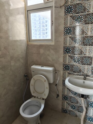 Bathroom in 2 BHK Apartment at Signature Global Proxima, Sector 89 – for Rent