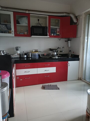 Kitchen in 3 BHK Apartment at AMIS Pranam Towers, Charholi Budruk – for Sale