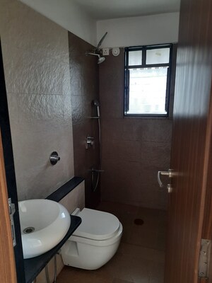 Bathroom in 2 BHK Apartment at Kohinoor Courtyard One, Wakad – for Sale