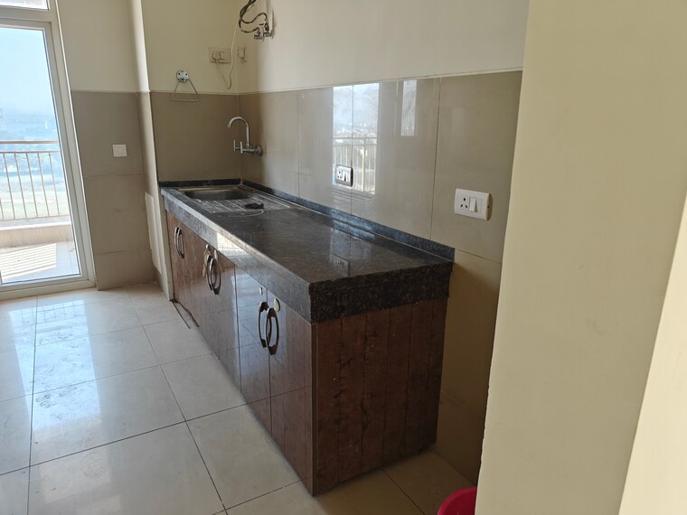 Kitchen, emaar-palm-gardens 3 Bedroom 1850 Sq.Ft. Apartment In Sector 83 Gurgaon 9422811