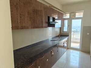Kitchen in 3 BHK Apartment at Emaar Palm Gardens, Sector 83 – for Rent