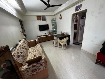 Living Room in 4 BHK Apartment at Raheja Crest 1 Co operative Housing Society Limite, Andheri West – for Sale