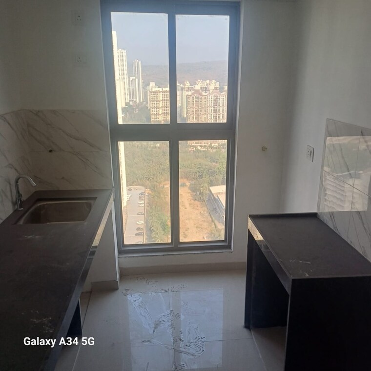 Kitchen, uk-iridium 1 Bedroom 425 Sq.Ft. Apartment In Kandivali East Mumbai 9414534