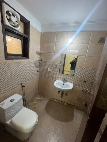 Bathroom in 2 BHK Builder Floor at Freedom Fighters Enclave – for Rent