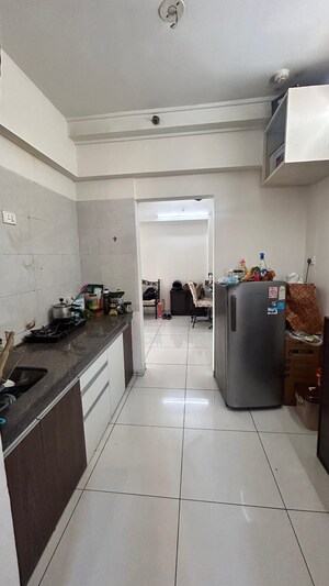 Kitchen in 1 BHK Apartment at Duville Riverdale Heights, Kharadi – for Sale