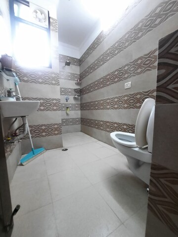 Bathroom in 1.5 BHK Builder Floor at Malviya Nagar – for Sale
