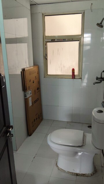 Bathroom in 3 BHK Apartment at Amrapali Eden Park, Sector 50 – for Rent
