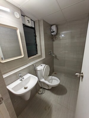 Bathroom in 1 BHK Apartment at Runwal Gardens, Dombivli East – for Sale