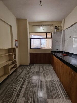 Kitchen in 2 BHK Apartment at Cosmos Heritage, Manpada – for Rent