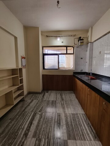 Kitchen in 2 BHK Apartment at Cosmos Heritage, Manpada – for Rent