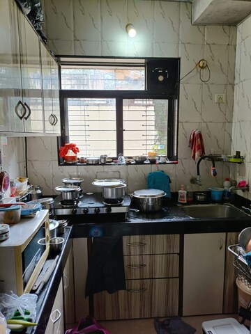 Kitchen in 1 BHK Apartment at Shree Vallabh Shanti CHS, Dahisar West – for Sale