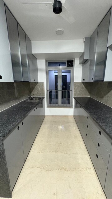 Kitchen in 3 BHK Apartment at Oberoi Sky City, Borivali East – for Sale