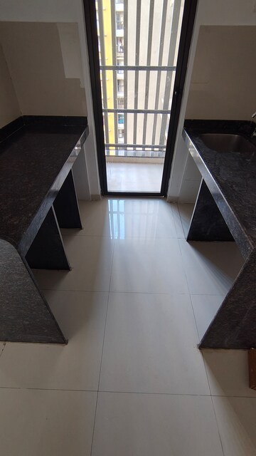 Kitchen in 1 BHK Apartment at Lodha Palava City Lakeshore Greens, Dombivli East – for Rent