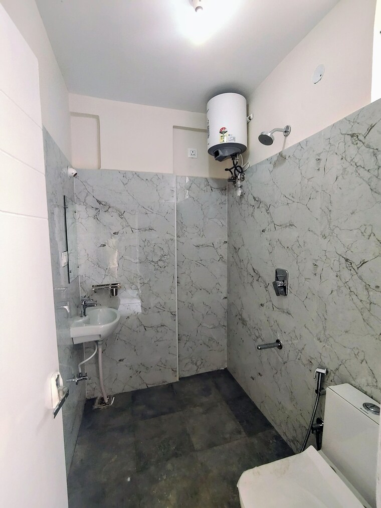 Bathroom, reliaable-ecity-plan-2 1 Bedroom 625 Sq.Ft. Apartment In Haralur Road Bangalore 9424666