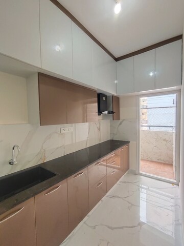 Kitchen in 2 BHK Apartment at Reliaable Ecity Plan 2, Haralur Road – for Rent