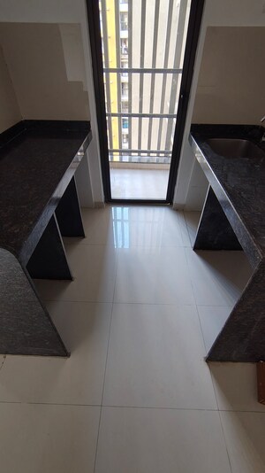 Kitchen in 1 BHK Apartment at Lodha Palava City Lakeshore Greens, Dombivli East – for Sale