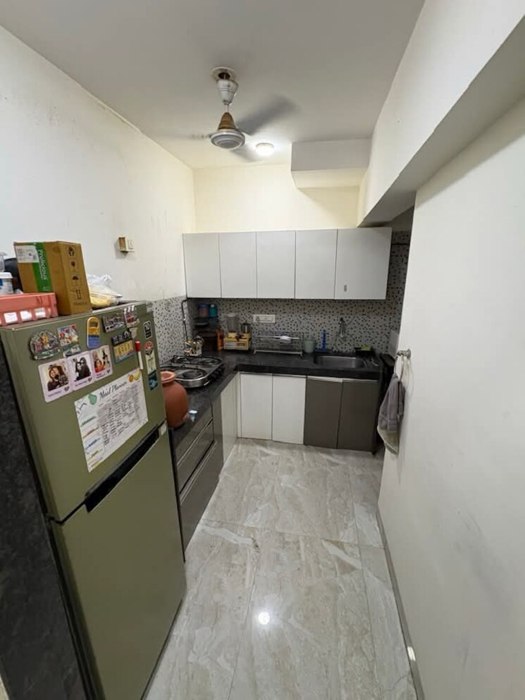 Kitchen, dn nagar 2 Bedroom 700 Sq.Ft. Apartment In Dn Nagar Mumbai 9424706