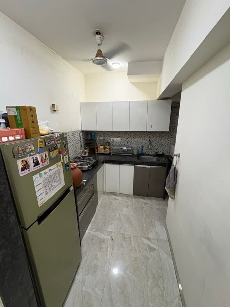Kitchen, dn nagar 2 Bedroom 700 Sq.Ft. Apartment In Dn Nagar Mumbai 9424706