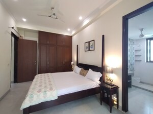 Bedroom in 4 BHK Builder Floor at Sushant Lok I – for Rent