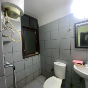 Bathroom in 1 RK Apartment at Maya Garden City, Nagla Road – for Rent