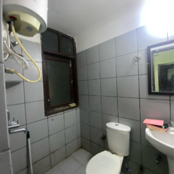 Bathroom in 1 RK Apartment at Maya Garden City, Nagla Road – for Rent