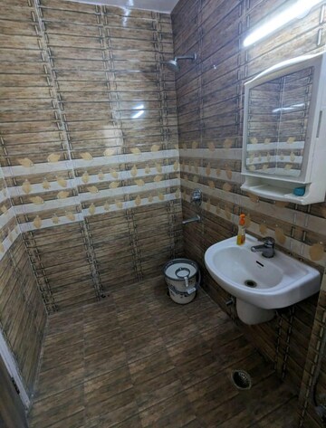 Bathroom in 3 BHK Apartment at Lalleshwari Vatika cghs, Sector 21d – for Rent