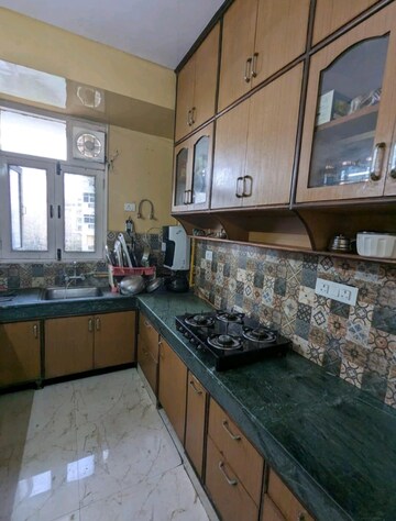 Kitchen in 3 BHK Apartment at Lalleshwari Vatika cghs, Sector 21d – for Rent