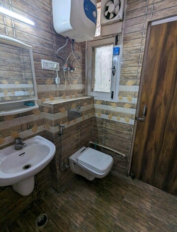 Bathroom in 3 BHK Apartment at Lalleshwari Vatika cghs, Sector 21d – for Rent