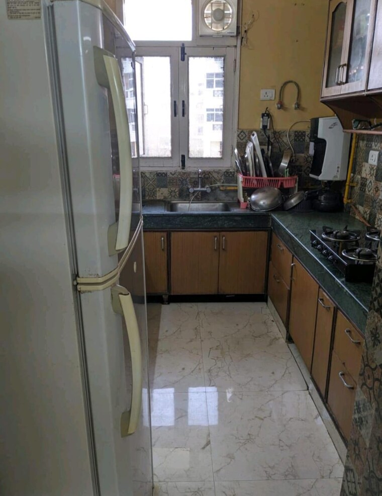 Kitchen, lalleshwari-vatika-cghs 3 Bedroom 1600 Sq.Ft. Apartment In Sector 21d Faridabad 9424788