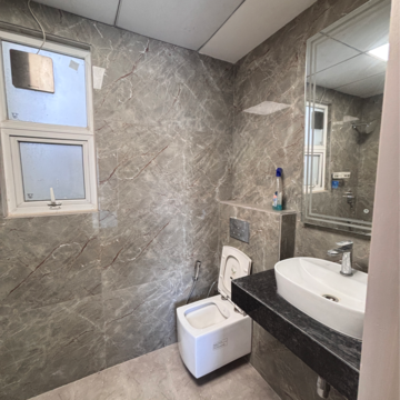 Bathroom in 3 BHK Apartment at One Oak Atmos, Vibhuti Khand – for Rent