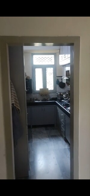 Kitchen in 3 BHK Apartment at Samridhi CGHS Apartments, Sector 21c – for Sale