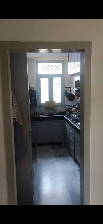 Kitchen in 3 BHK Apartment at Samridhi CGHS Apartments, Sector 21c – for Sale