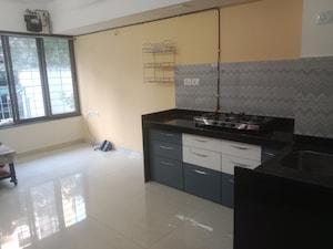 Kitchen in 1 BHK Apartment at Lodha Crown Quality Homes, Majiwada – for Rent