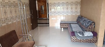Living Room in 3 BHK Apartment at Poddar Palm Meadows, Makarba – for Rent