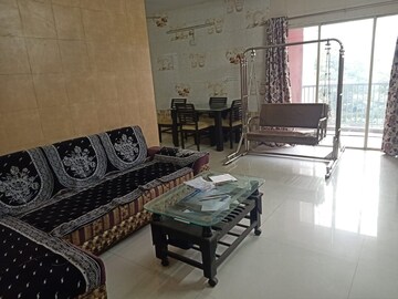 Living Room in 3 BHK Apartment at Poddar Palm Meadows, Makarba – for Rent