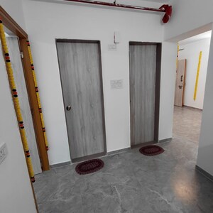 Building Lobby in 1 BHK Apartment at Shraddha Evoque, Sonapur – for Rent