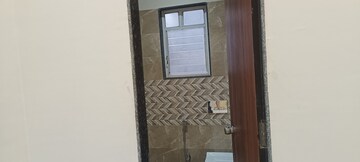 Bathroom in 2 BHK Apartment at SS Rutuparna, Moshi – for Rent