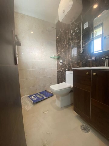 Bathroom in 3 BHK Builder Floor at Ganga Apartments Burari, Burari – for Rent